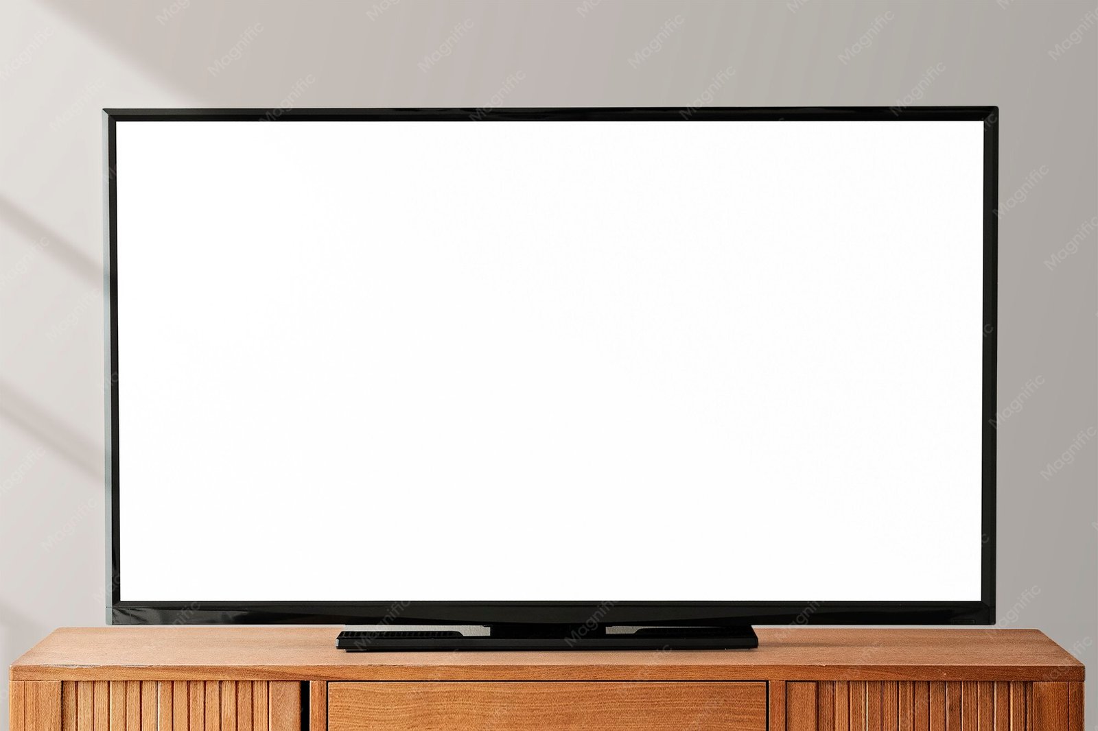 Modern smart TV screen standing on a wooden table